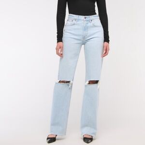 Black Long Sleeve Top and Light Blue Ripped Jeans